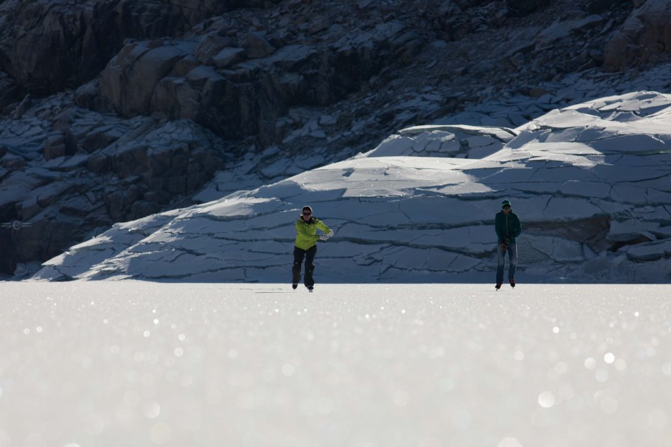 john minogue, giulia monego. emosson dam. ice skate