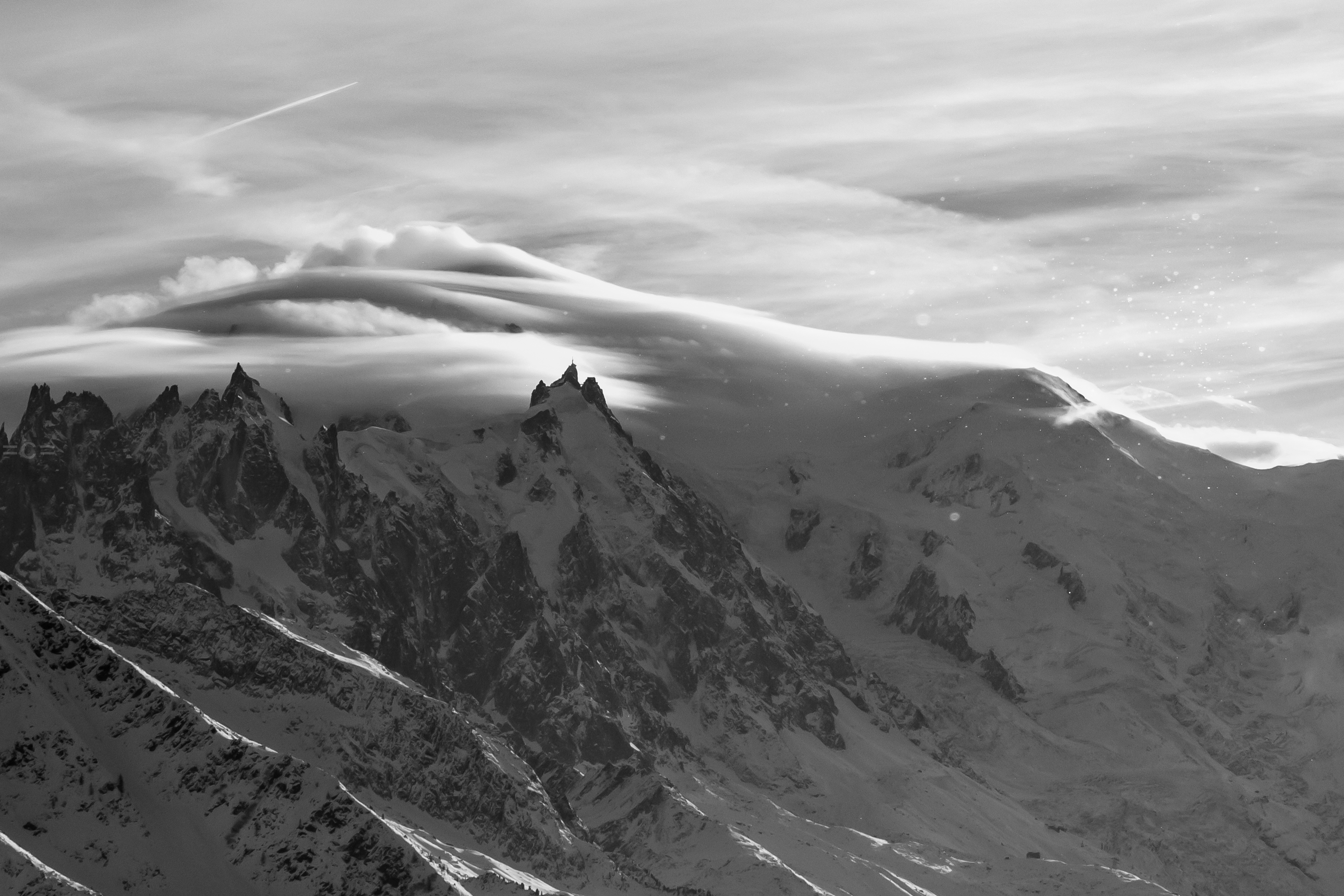aiguille du midi, mont blanc under clouds